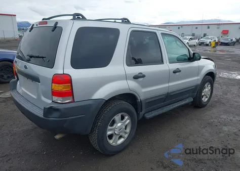 2003 Ford Escape Xlt z USA, uszkodzony, nr VIN 1FMYU03193KA78387